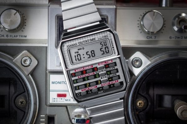 Casio CA500WEBF-1A Recreates Marty McFly’s Calculator Watch in a DeLorean-Themed All-Metal Skin